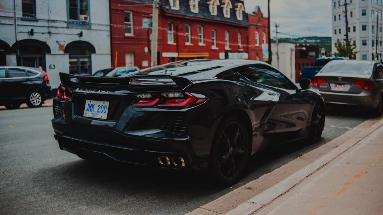 Corvette sports car in moody garage lighting