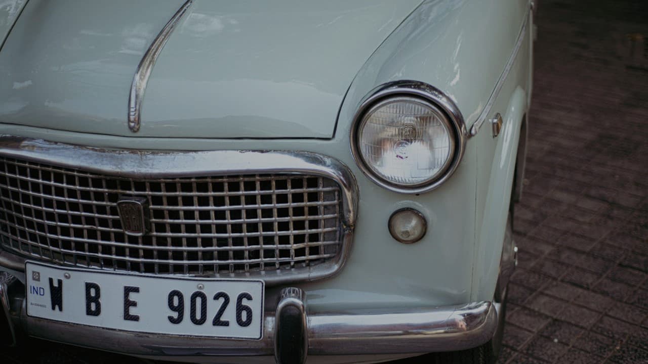 Restored vintage car at golden hour